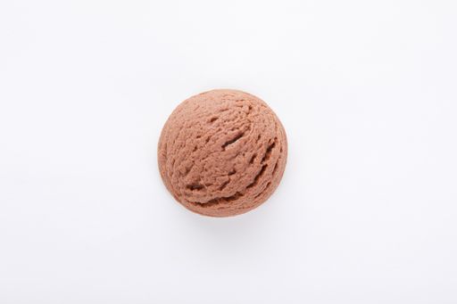 A top view of a delicious chocolate ice cream scoop isolated on a white surface
