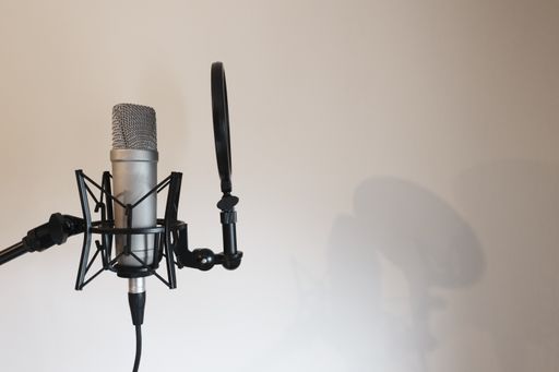 A closeup of a studio microphone