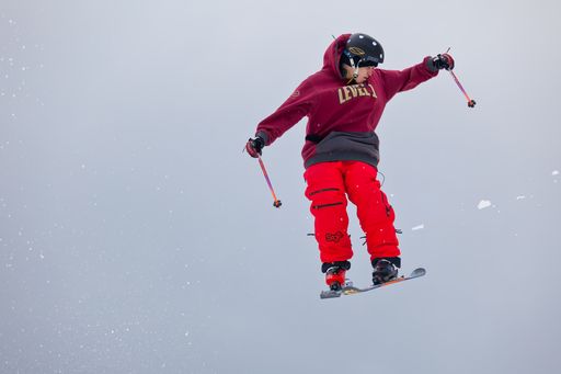 Snow Skiers at the Wisp Ski Resort in McHenry, Maryland Completing Skill Maneuvers during the Maryland Open Freestyle Ski Competition.
