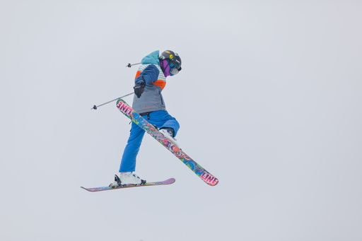 A young skier making a aerial high jump during freestyle ski competition at the Wisp Ski Resor.