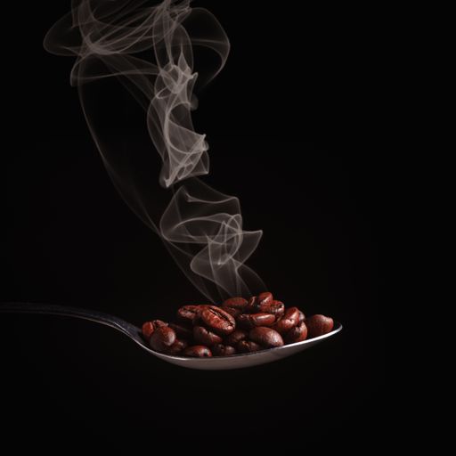 A spoonful of hot roasted coffee beans on a black background