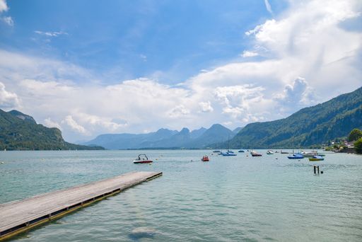 A beautiful shot of a bay with fishing boats on a sunny summer dat