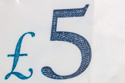 A close up of a five-pound banknote texture