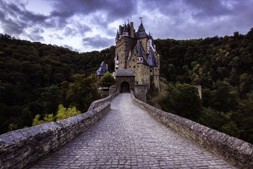 Eltz Castle is a medieval castle nestled in the hills above the Moselle River between Koblenz and Trier, Germany. It is still owned by a branch of the