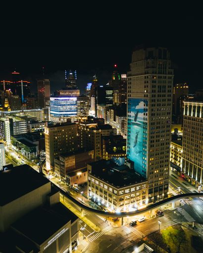 Detroit city night photo featuring Broderick Tower