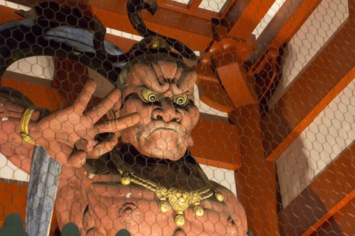 One of the Nio guardian statues from Hozomon (Treasure-House Gate) at Asakusa Shrine, Senso-ji Temple at night (Taito, Tokyo, Japan)