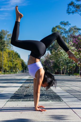 woman doing yoga in the park