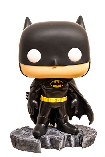 Large size funko pop figure of the character batman, from the comics movies of the DC group isolated on white background.