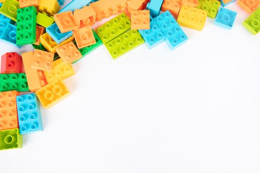 A colorful building toy blocks with white space on the lower portion for text