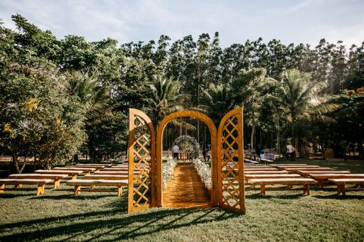 A wedding ceremony with beautiful decorations outside in the garden