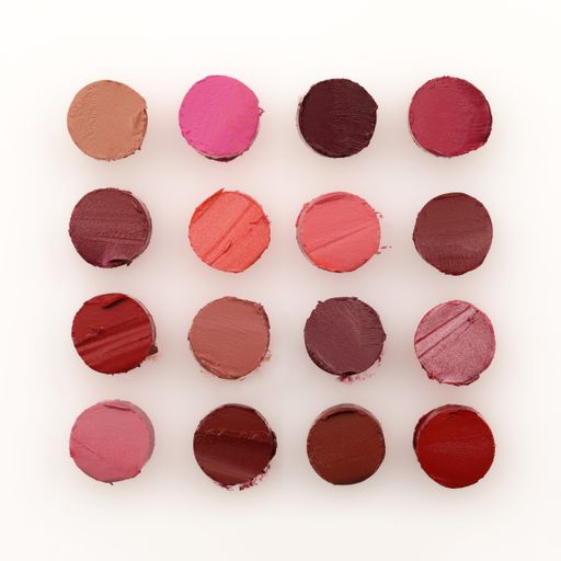 A closeup shot of multicolored eyeshadows on white background