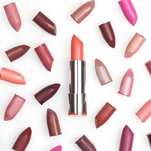 A closeup shot of colorful lipsticks isolated on white background