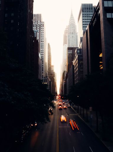 A vertical shot of Midtown Manhattan in NYC during sunset