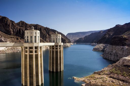 Hoover Dam is a concrete arch-gravity dam in the Black Canyon of the Colorado River, on the border between the U.S. states of Nevada and Arizona.