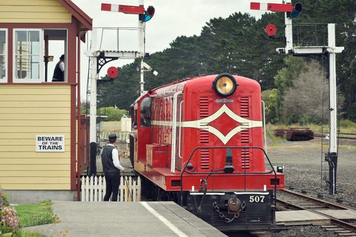 View of English Electric DE507 diesel locomotive pulling train at Glenbrook Vintage Railway