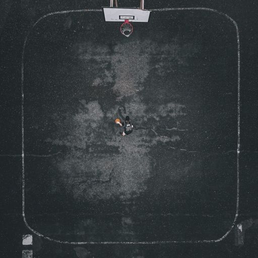 An aerial view of outdoor public basketball courts