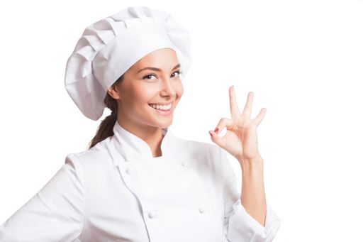 Gorgeous young brunette chef woman isolated on white background.