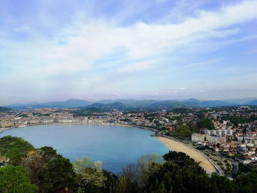 A high angle shot of a mesmerizing beach scenery in San Sebastian, Spain
