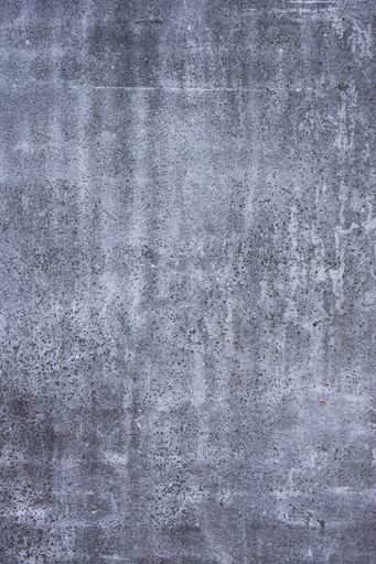 A vertical shot of a concrete surface with a copy space