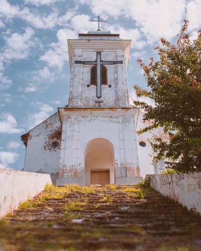 A low angle shot of the Chapel of the Holy Cross in Vrsac, Serbia
 on a sunny day