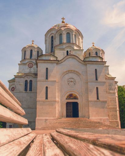 A low angle shot of Holy Martyr George church on a sunny day in Topola, Serbia
