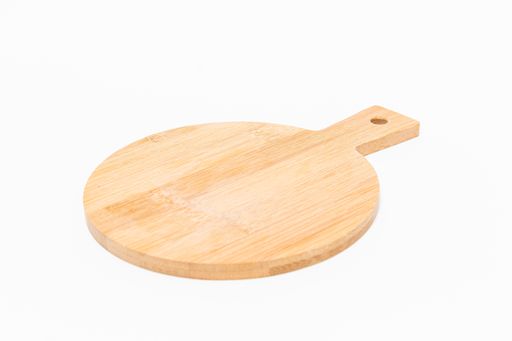 A closeup shot of a wooden chopping board isolated on a white background