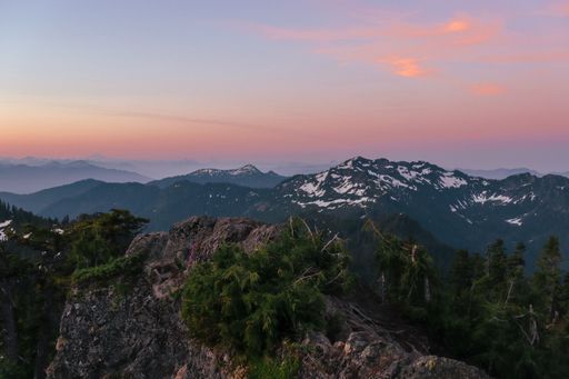A beautiful view of rocky mountains during sunset