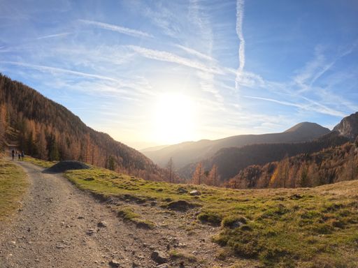 A picturesque view of a nature trail snaking its way down the side of a mountain, Pfannock, Carinthia, Austria