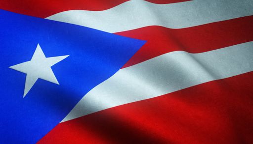 A closeup shot of the waving flag of Puerto Rico with interesting textures