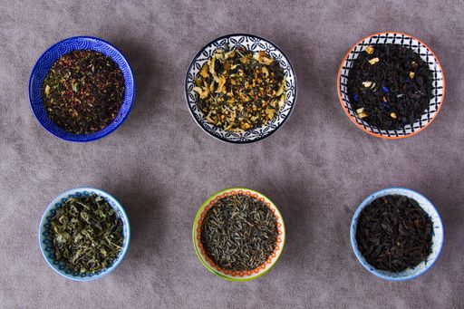 A top view of the herbal and natural dry tea variation in bowls