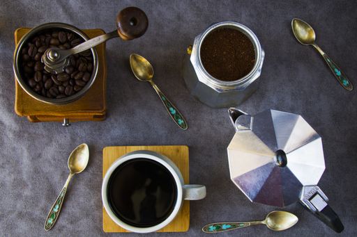 An overhead shot of coffee accessories and coffee ingredients