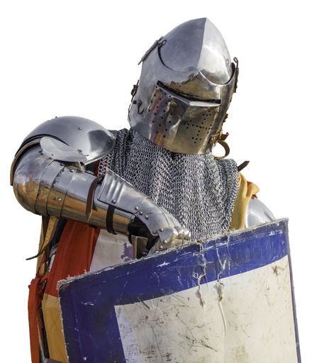 A Spanish medieval knight with a helmet and a shield isolated on a white background