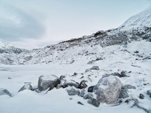 The beautiful view of snowy mountains in the Arctic, Kvaloya Island, Tromso, Norway