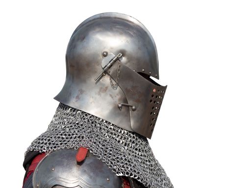 A side view of a Portuguese medieval knight with a helmet isolated on a white background