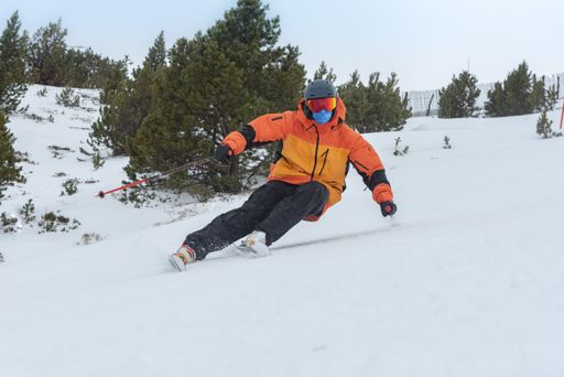 A young man skiing in the Pyrenees at the Grandvalira ski resort in Andorra in Covid-19 time