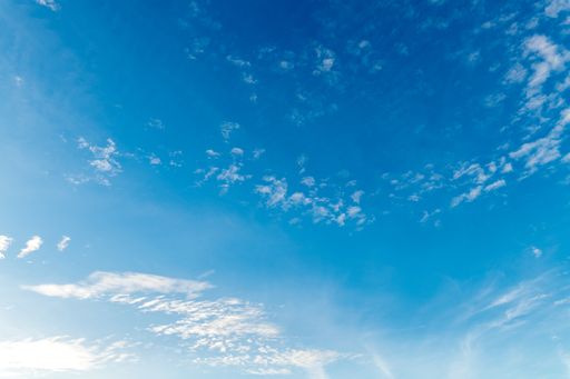 A low angle shot of a clear blue sky during daytime