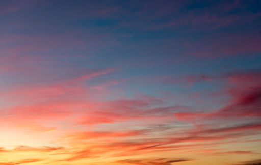 A breathtaking shot of a sunset and a colorful sky-good for a background