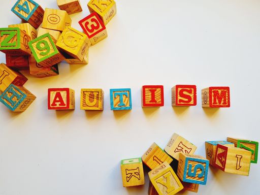 An isolated shot of wooden cubes with different colorful letters