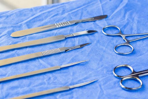 A closeup of a dissection kit on the sterile table