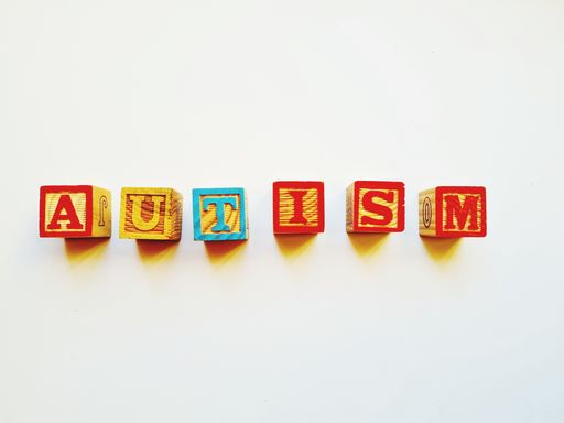 An isolated shot of wooden cubes with different colorful letters
