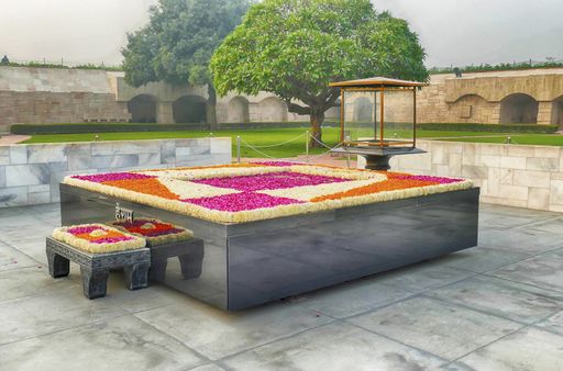The Raj Ghat memorial surrounded by a garden under the sunlight in Delhi, India