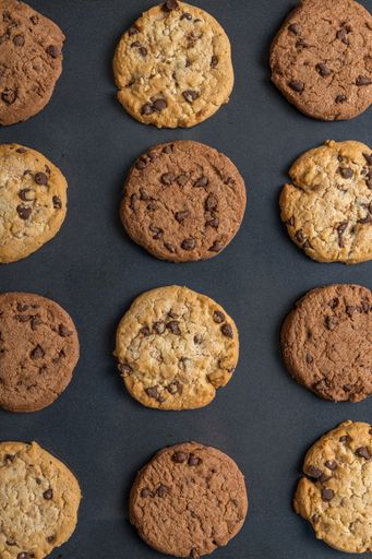 A top view of chocolate chip cookies on a baking pan