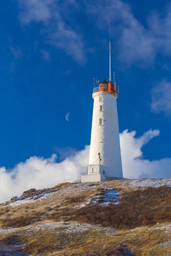 A vertical shot of the Reykjanesviti lighthouse during the daytime in Iceland