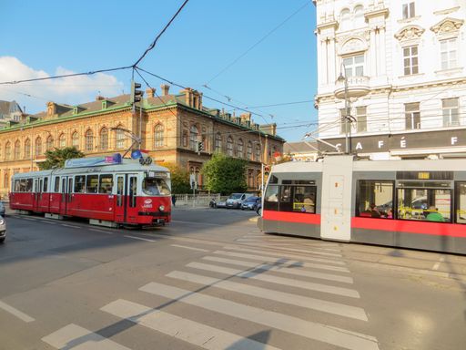 A wide angle shot of different means of transport around the Sigmund-Freud Park in Austria