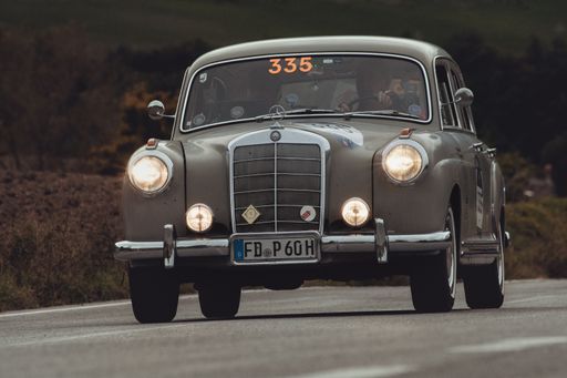 CAGLI , ITALY - OTT 24 - 2020 : MERCEDES-BENZ 220 A 1955 an old racing car in rally Mille Miglia 2020 the famous italian historical race (1927-1957)