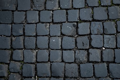 A top view of black basalt paving in central ancient Rome