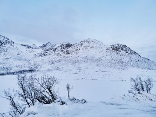 A beautiful Arctic landscape with the Kattfjordvatnet lake in Kvaloya Island, Norway during winter