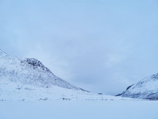 A beautiful Arctic landscape with the Kattfjordvatnet lake in Kvaloya Island, Norway during winter