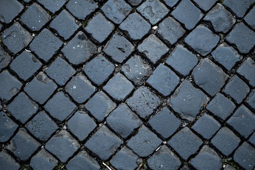 A top view of black basalt paving in central ancient Rome