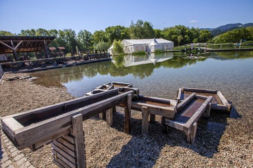 A camping area near the lake in the countryside in the Waterpark Radlje, Slovenia